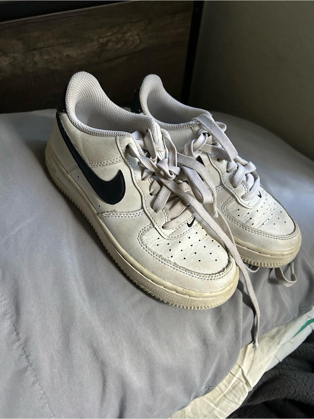 Nike Kids White Sneakers with Black Swoosh and Cream Sole